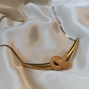 (3/$15)Vintage necklace with enamelled knot detail